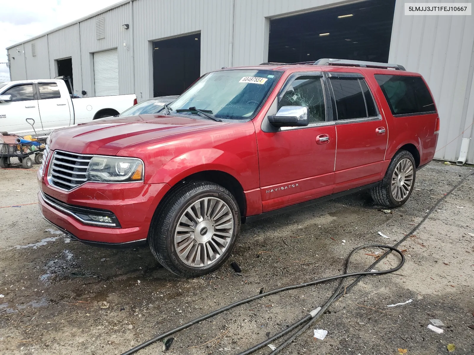 2015 Lincoln Navigator L VIN: 5LMJJ3JT1FEJ10667 Lot: 68497554