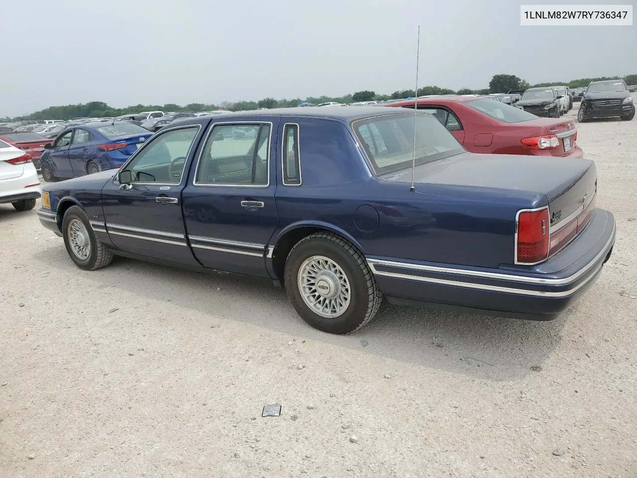 1994 Lincoln Town Car Signature VIN: 1LNLM82W7RY736347 Lot: 54837114