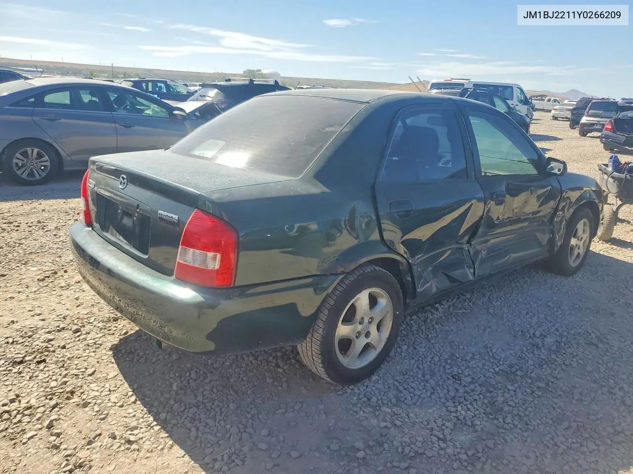 2000 Mazda Protege Es VIN: JM1BJ2211Y0266209 Lot: 56150106