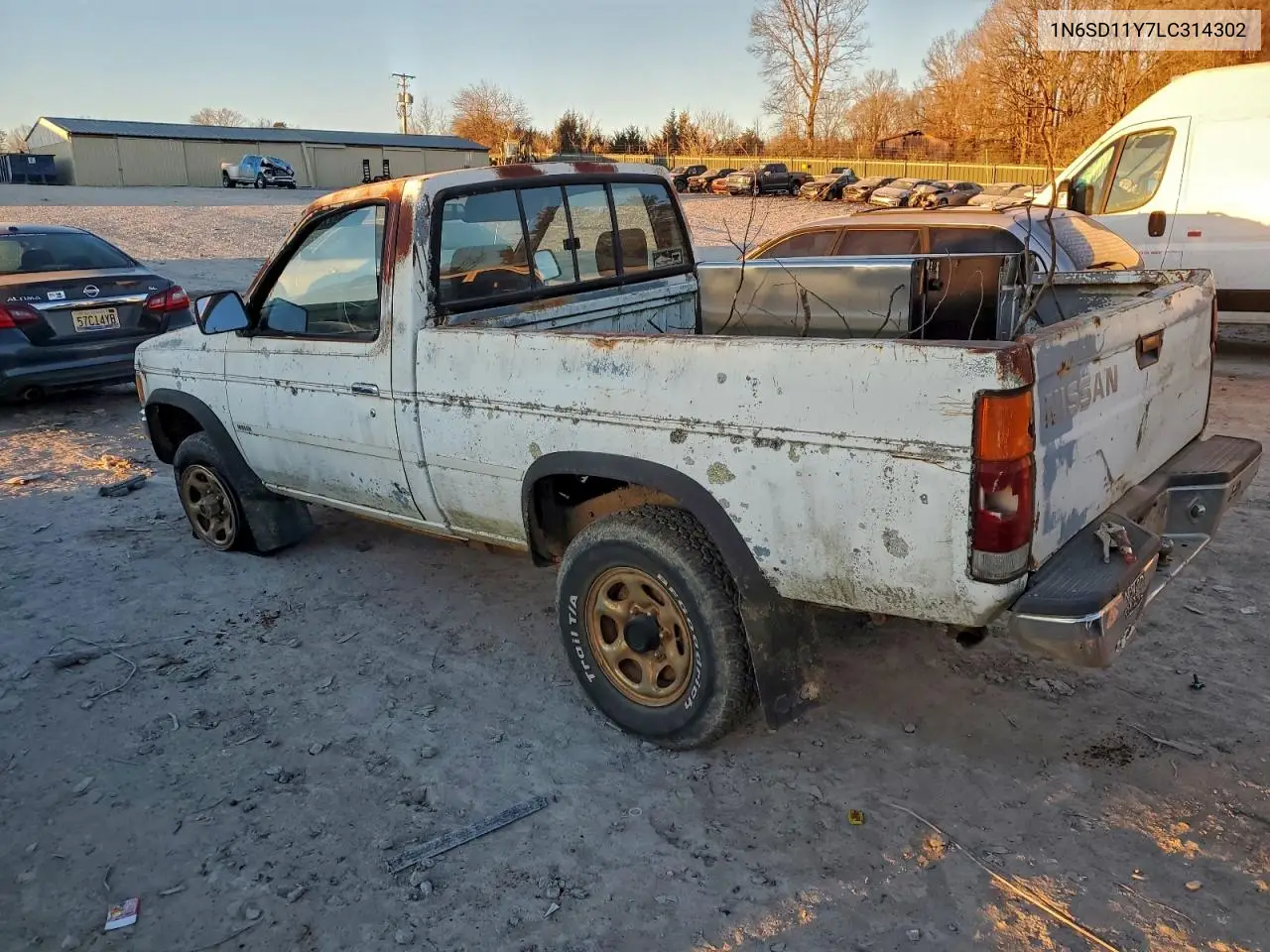 1N6SD11Y7LC314302 1990 Nissan D21 Short Bed