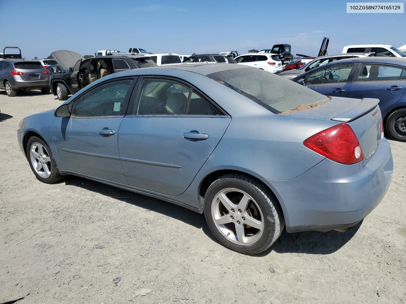 2007 Pontiac G6 Base VIN: 1G2ZG58N774165129 Lot: 66618034