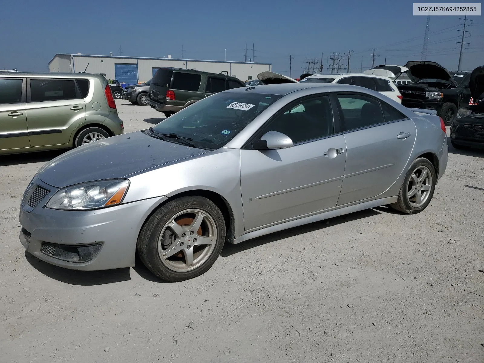 2009 Pontiac G6 VIN: 1G2ZJ57K694252855 Lot: 65136104