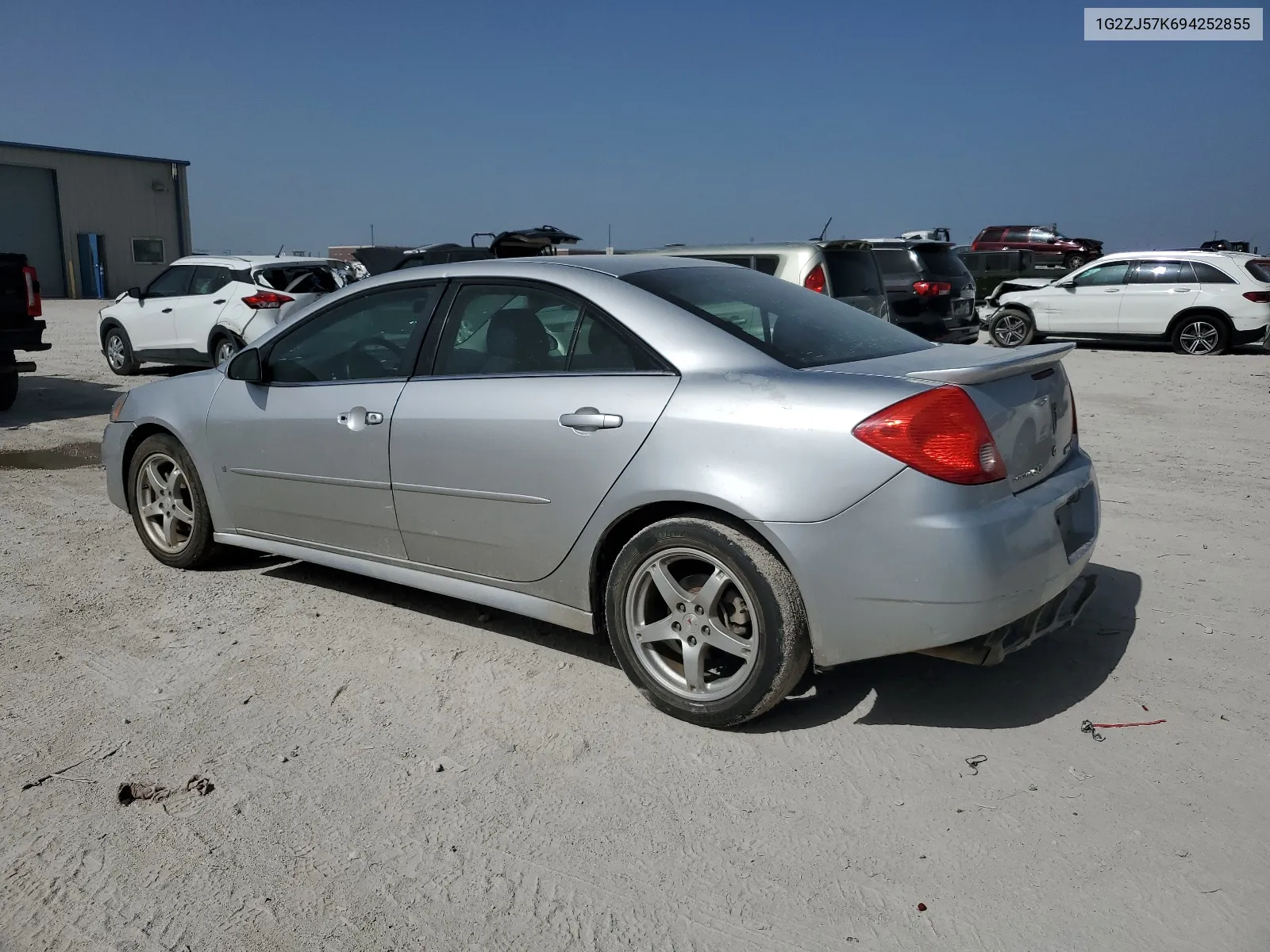 2009 Pontiac G6 VIN: 1G2ZJ57K694252855 Lot: 65136104