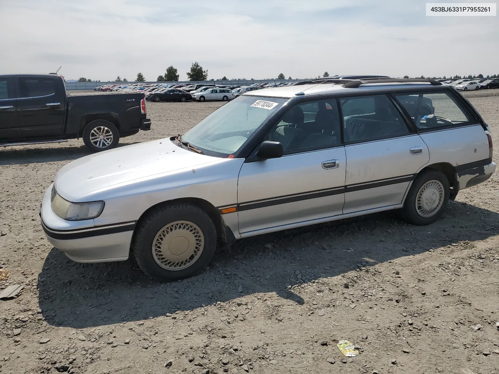 1993 Subaru Legacy L VIN: 4S3BJ6331P7955261 Lot: 59770344