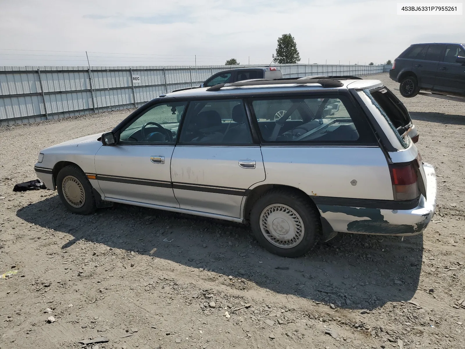 1993 Subaru Legacy L VIN: 4S3BJ6331P7955261 Lot: 59770344