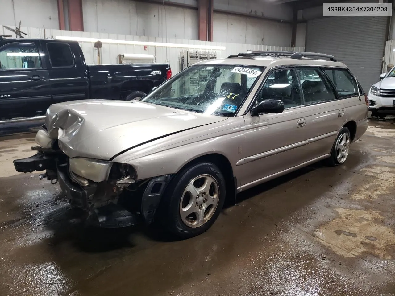 1999 Subaru Legacy L VIN: 4S3BK4354X7304208 Lot: 44354304