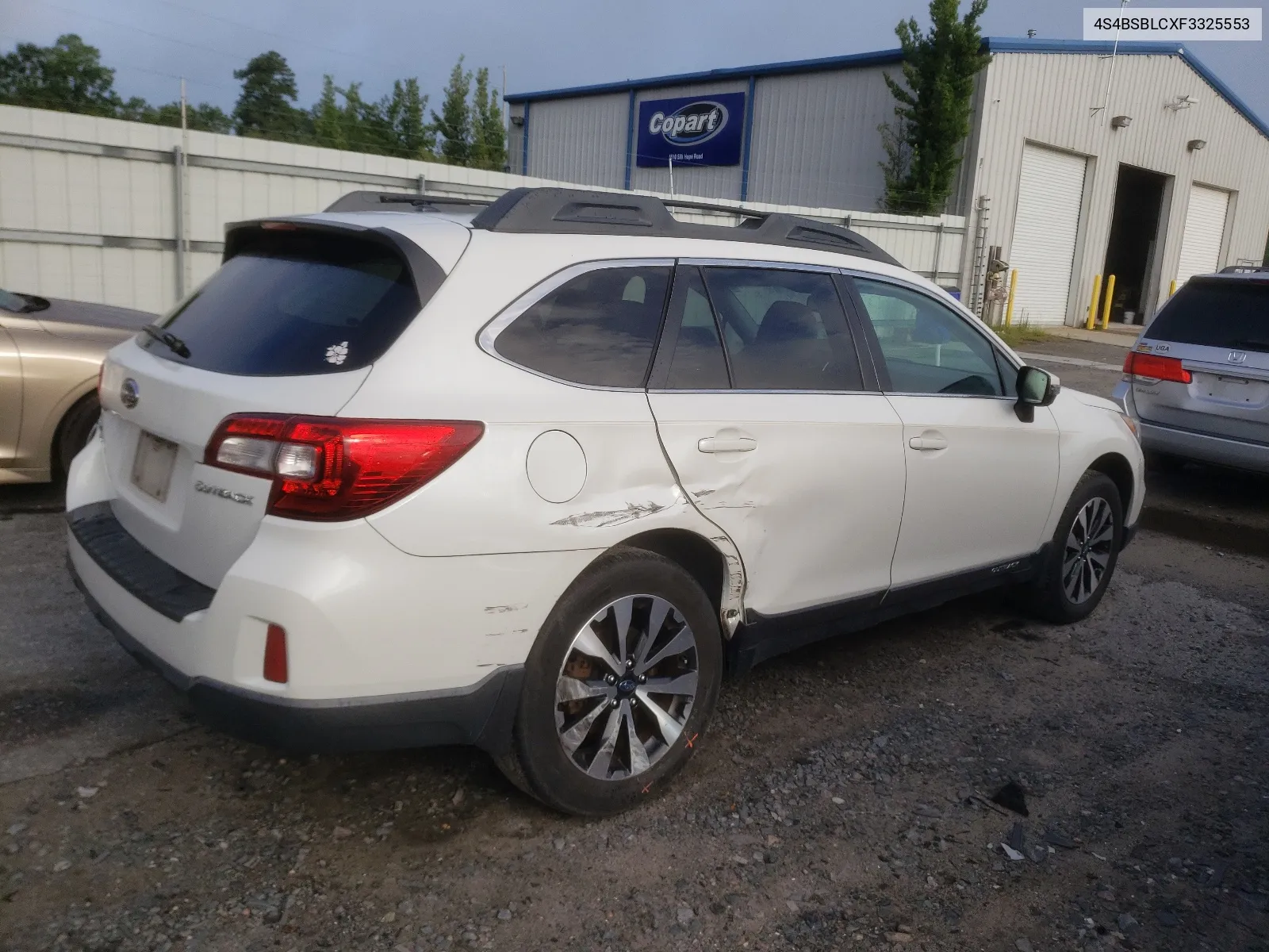 2015 Subaru Outback 2.5I Limited VIN: 4S4BSBLCXF3325553 Lot: 64031264