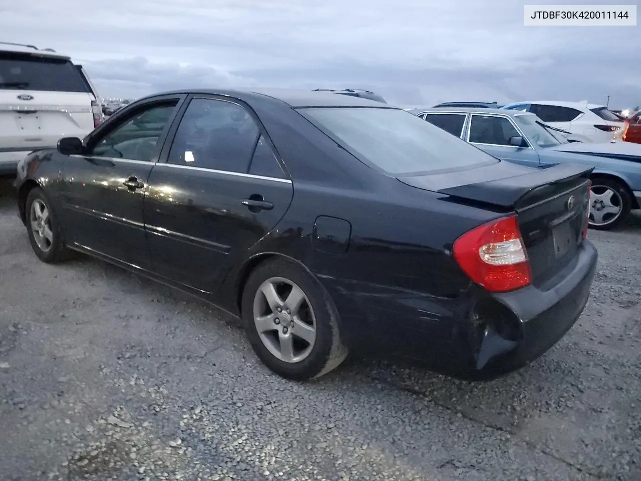 JTDBF30K420011144 2002 Toyota Camry Le