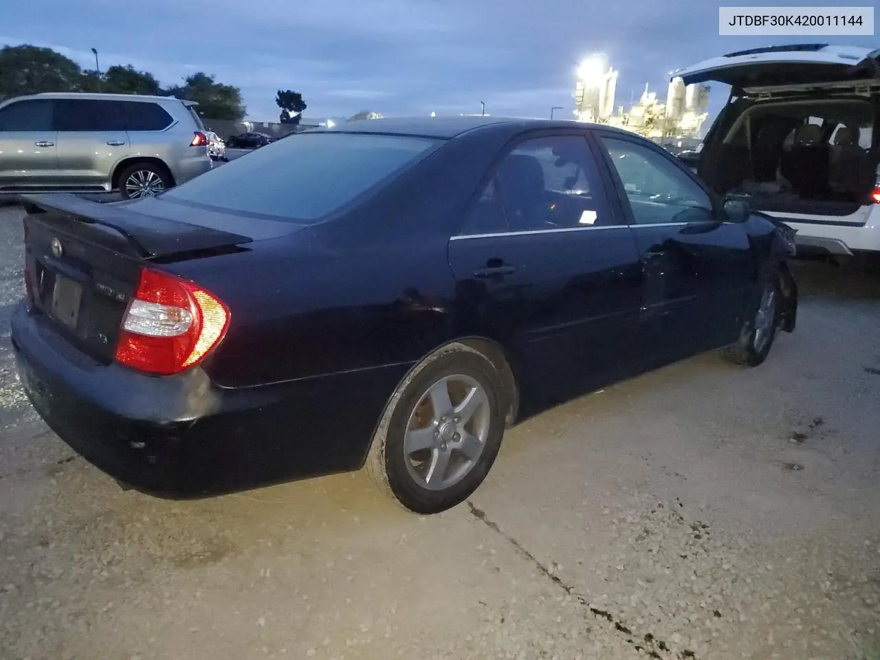 JTDBF30K420011144 2002 Toyota Camry Le