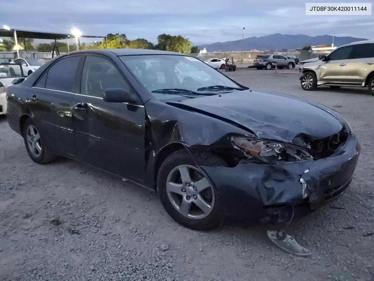 JTDBF30K420011144 2002 Toyota Camry Le