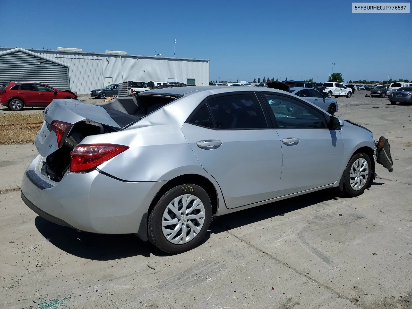 2018 Toyota Corolla L VIN: 5YFBURHE0JP776587 Lot: 56272604