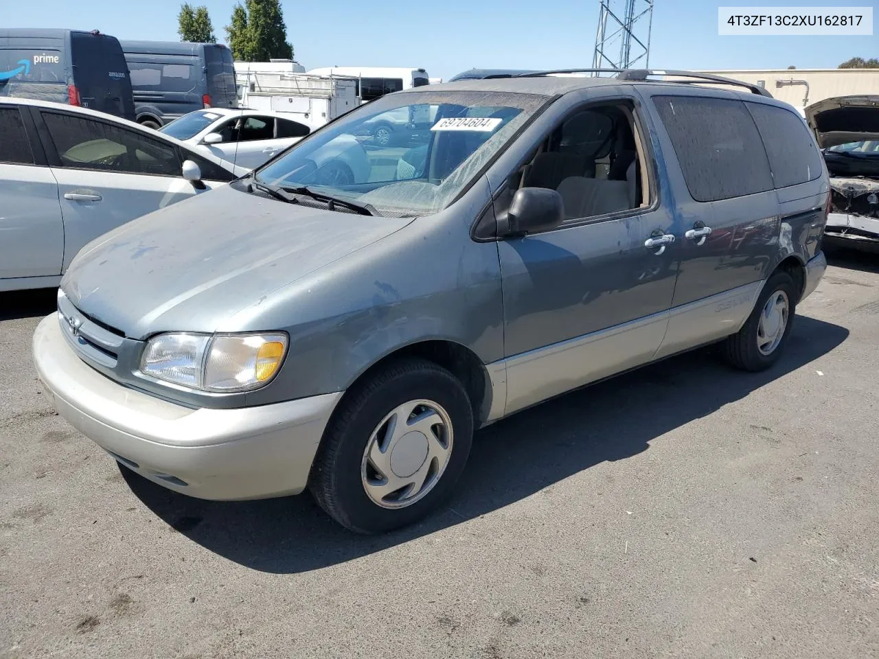 1999 Toyota Sienna Le VIN: 4T3ZF13C2XU162817 Lot: 69704604