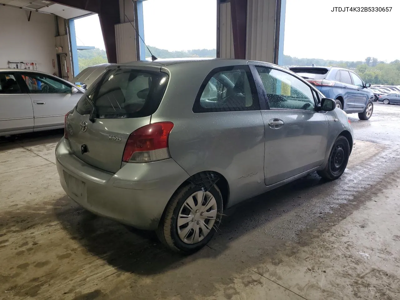 2011 Toyota Yaris VIN: JTDJT4K32B5330657 Lot: 73026134