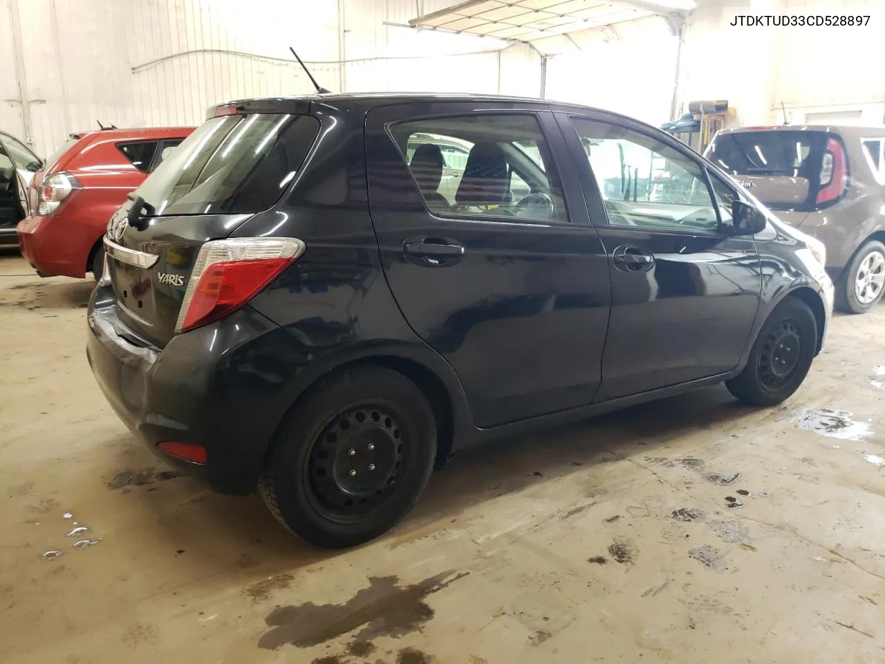 2012 Toyota Yaris VIN: JTDKTUD33CD528897 Lot: 63099854