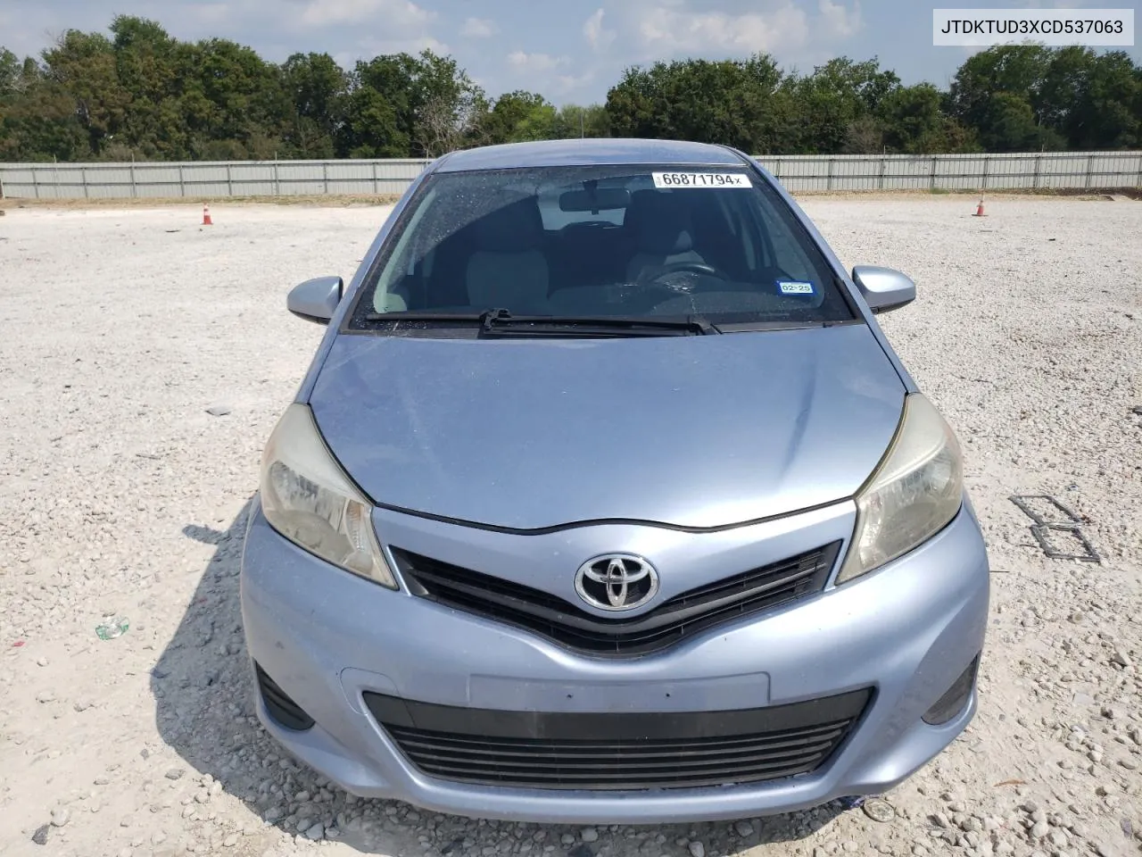 2012 Toyota Yaris VIN: JTDKTUD3XCD537063 Lot: 66871794