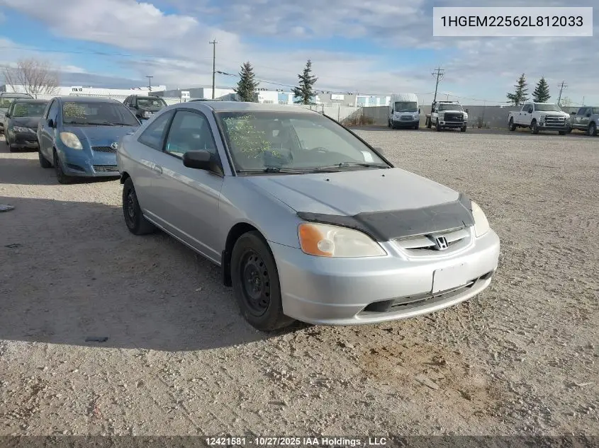 1HGEM22562L812033 2002 Honda Civic Lx