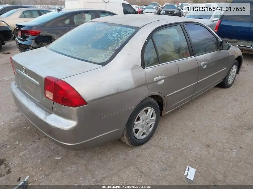 1HGES16544L017656 2004 Honda Civic Lx