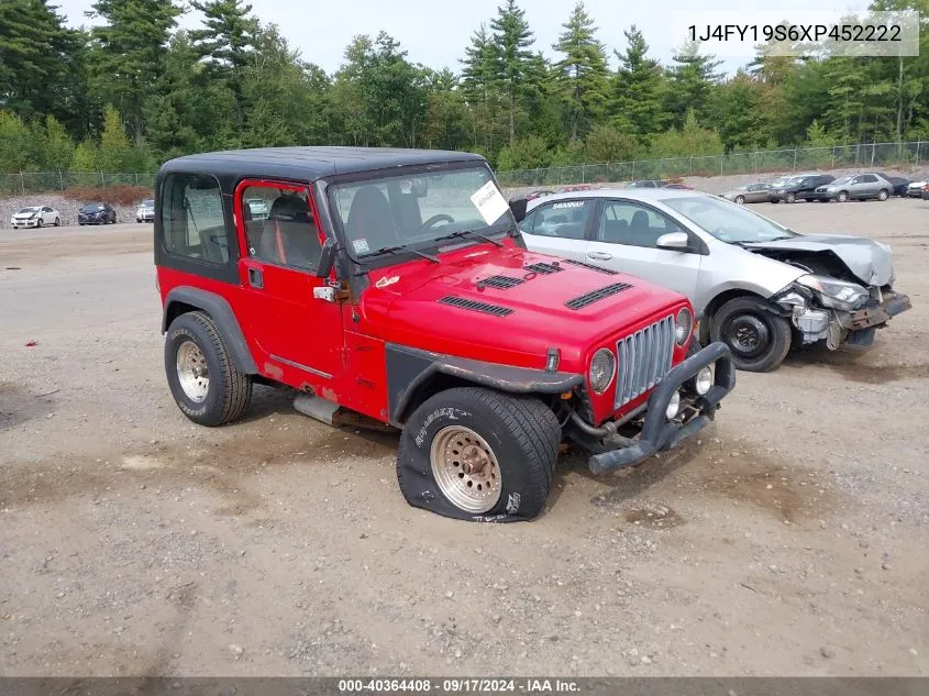 1999 Jeep Wrangler Sport VIN: 1J4FY19S6XP452222 Lot: 40364408