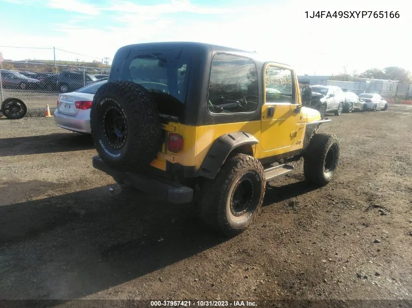 2000 Jeep Wrangler Sport VIN: 1J4FA49SXYP765166 Lot: 37957421