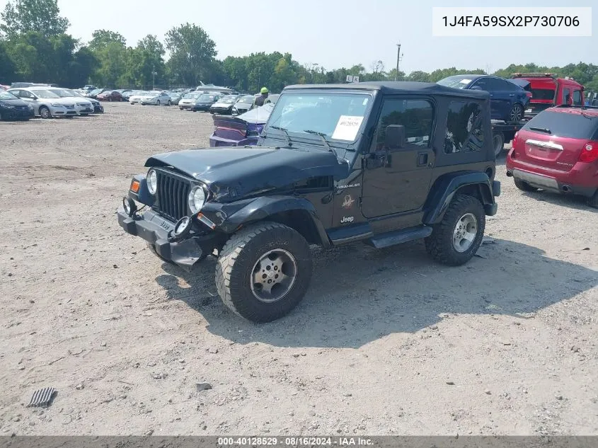 2002 Jeep Wrangler Sahara VIN: 1J4FA59SX2P730706 Lot: 40128529