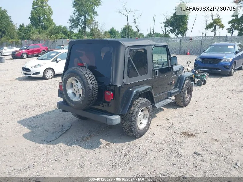 2002 Jeep Wrangler Sahara VIN: 1J4FA59SX2P730706 Lot: 40128529