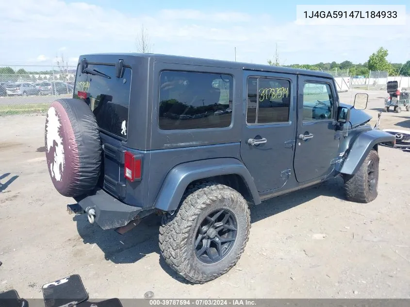 2007 Jeep Wrangler Unlimited Sahara VIN: 1J4GA59147L184933 Lot: 39787594