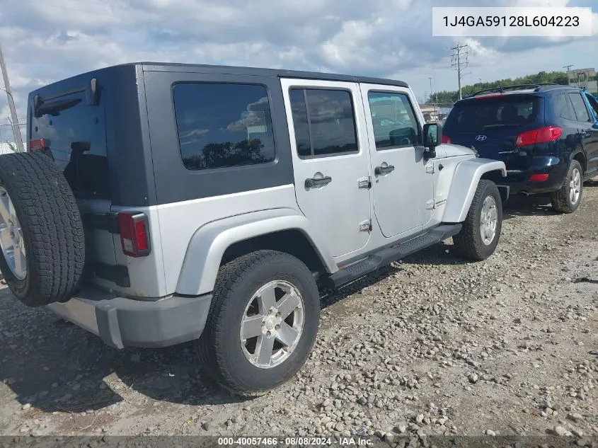 2008 Jeep Wrangler Unlimited Sahara VIN: 1J4GA59128L604223 Lot: 40057466