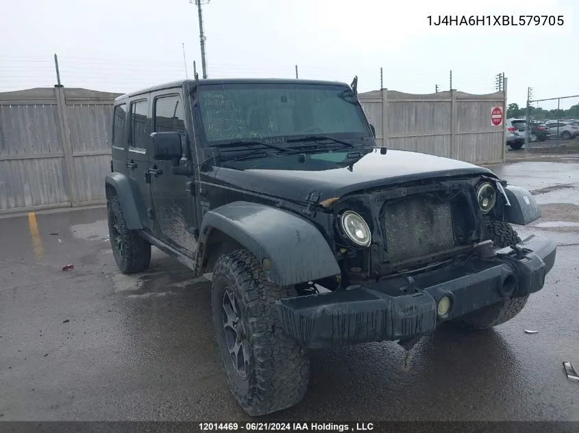 2011 Jeep Wrangler Unlimited VIN: 1J4HA6H1XBL579705 Lot: 12014469