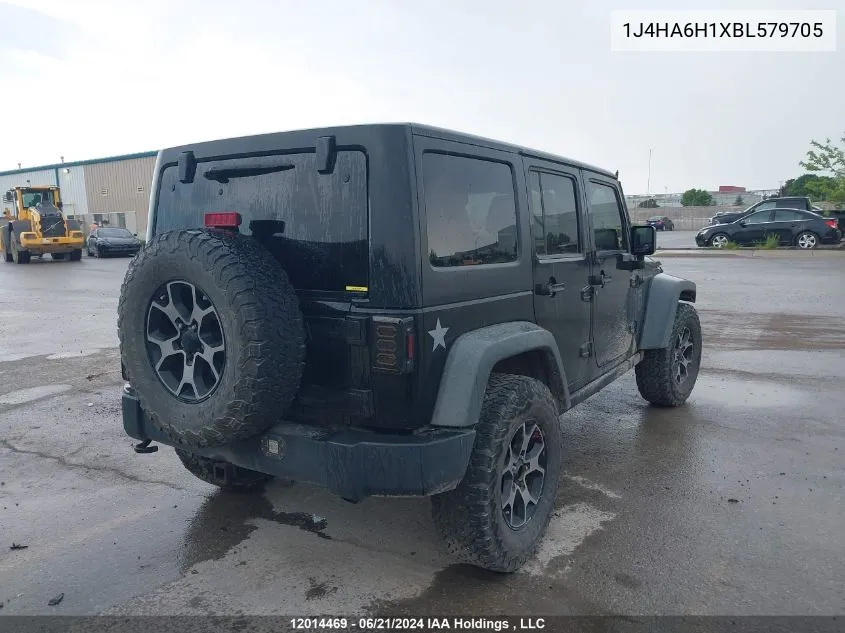 2011 Jeep Wrangler Unlimited VIN: 1J4HA6H1XBL579705 Lot: 12014469