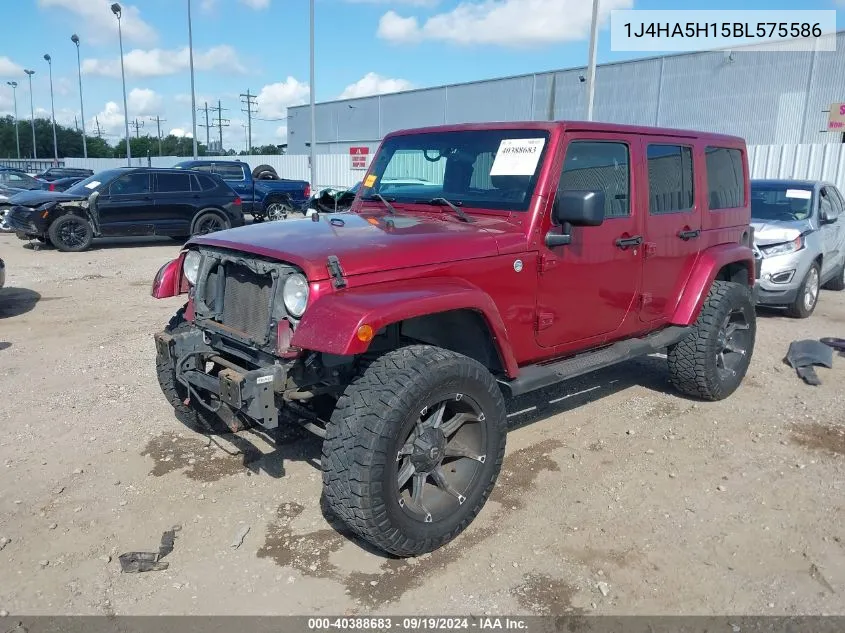 2011 Jeep Wrangler Unlimited Sahara VIN: 1J4HA5H15BL575586 Lot: 40388683