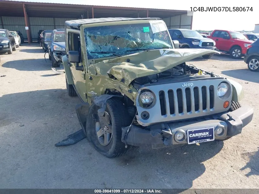 1C4BJWDG7DL580674 2013 Jeep Wrangler Unlimited Freedom Edition