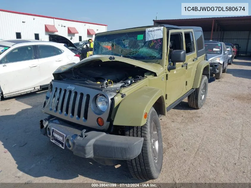 1C4BJWDG7DL580674 2013 Jeep Wrangler Unlimited Freedom Edition