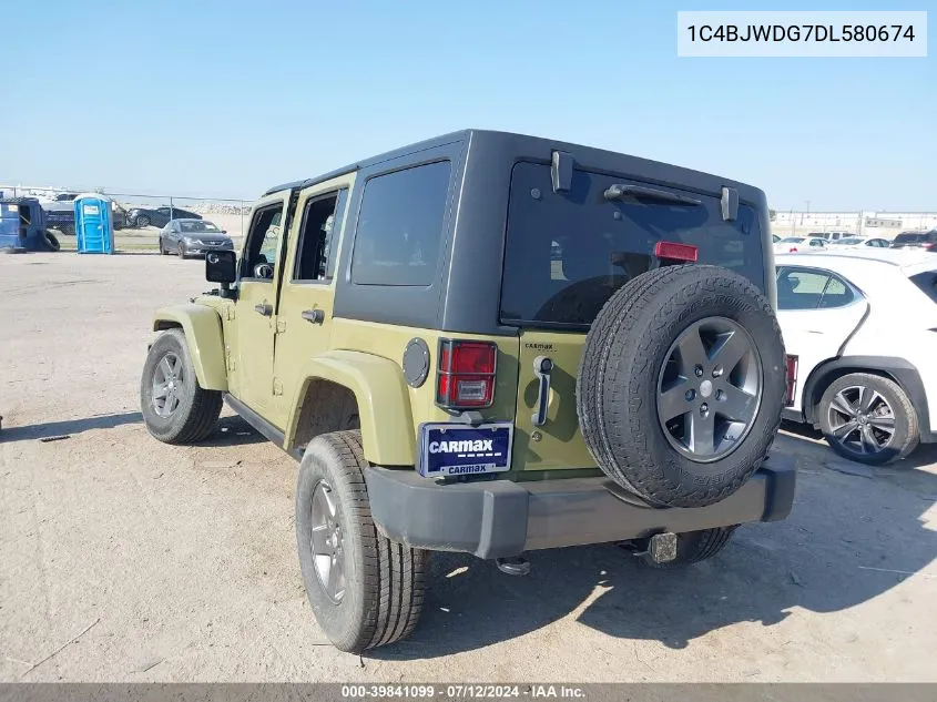 1C4BJWDG7DL580674 2013 Jeep Wrangler Unlimited Freedom Edition