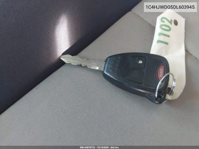 1C4HJWDG5DL603945 2013 Jeep Wrangler Unlimited Sport