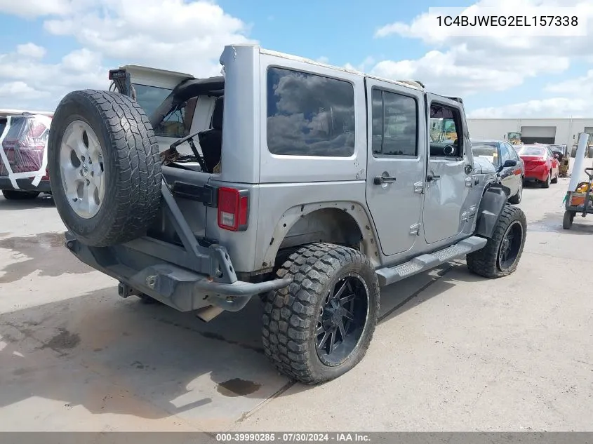 2014 Jeep Wrangler Unlimited Sahara VIN: 1C4BJWEG2EL157338 Lot: 39990285