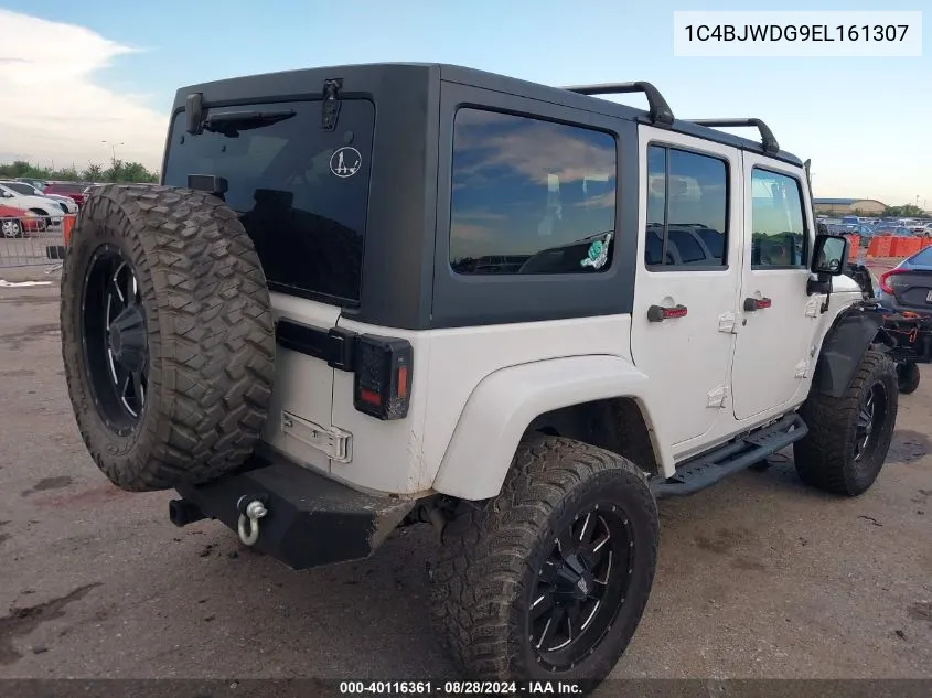 1C4BJWDG9EL161307 2014 Jeep Wrangler Unlimited Freedom Edition