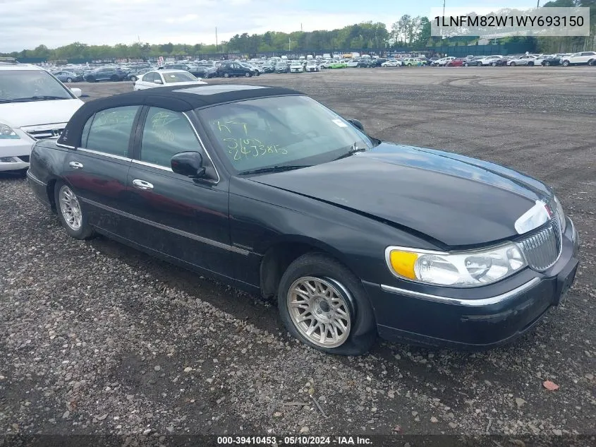 1998 Lincoln Town Car Signature VIN: 1LNFM82W1WY693150 Lot: 39410453