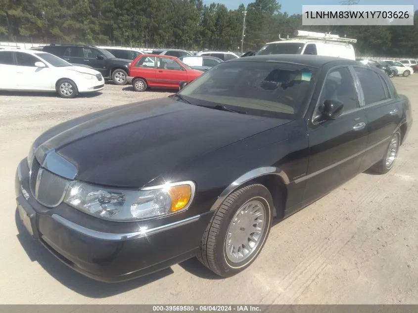 2001 Lincoln Town Car Cartier VIN: 1LNHM83WX1Y703626 Lot: 39569580