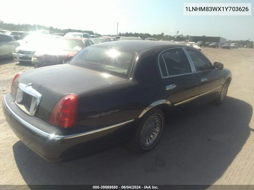 2001 Lincoln Town Car Cartier VIN: 1LNHM83WX1Y703626 Lot: 39569580