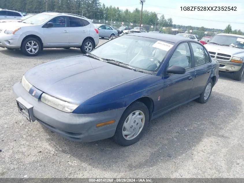 1999 Saturn Sl VIN: 1G8ZF528XXZ352542 Lot: 40141268