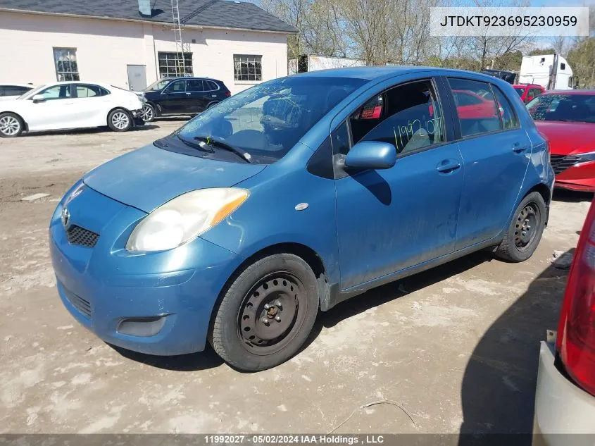 2009 Toyota Yaris VIN: JTDKT923695230959 Lot: 11992027